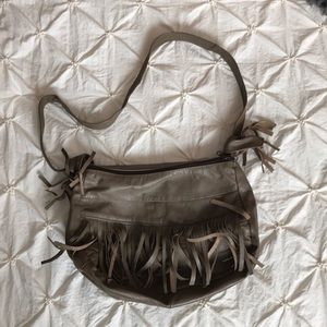 Leather tassel shoulder bag.